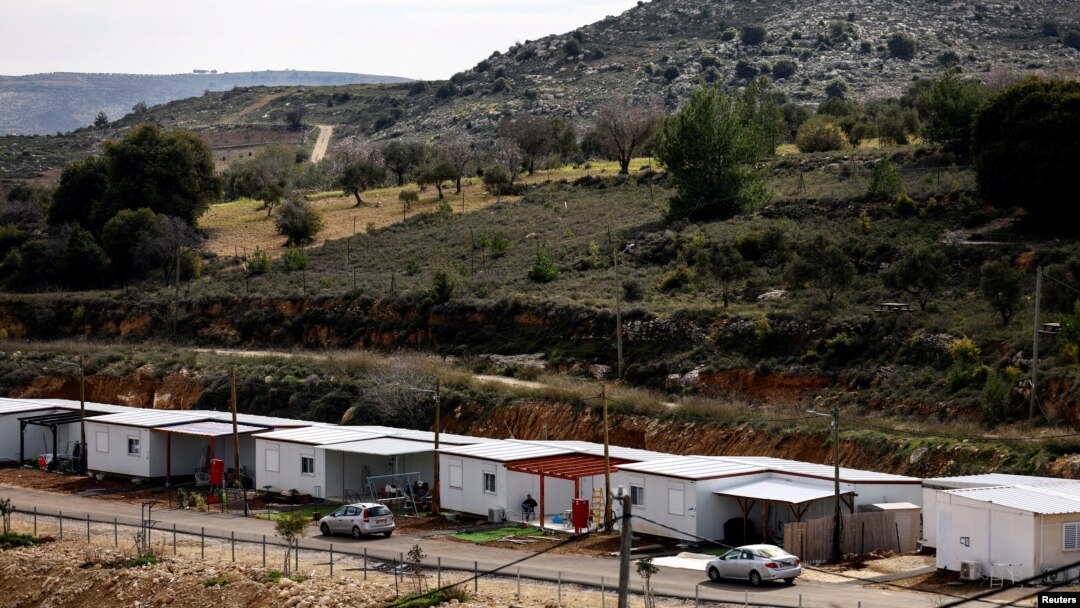 FILE - Mobile homes sit in the Jewish settlement of Givat Haroeh in the Israeli-occupied West Bank, Feb. 21, 2023. European Union envoy Sven Koopmans says Israeli settlements and violence in the West Bank are impediments to a peaceful two-state solution in the Middle East.