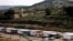 FILE - Mobile homes sit in the Jewish settlement of Givat Haroeh in the Israeli-occupied West Bank, Feb. 21, 2023. European Union envoy Sven Koopmans says Israeli settlements and violence in the West Bank are impediments to a peaceful two-state solution in the Middle East.