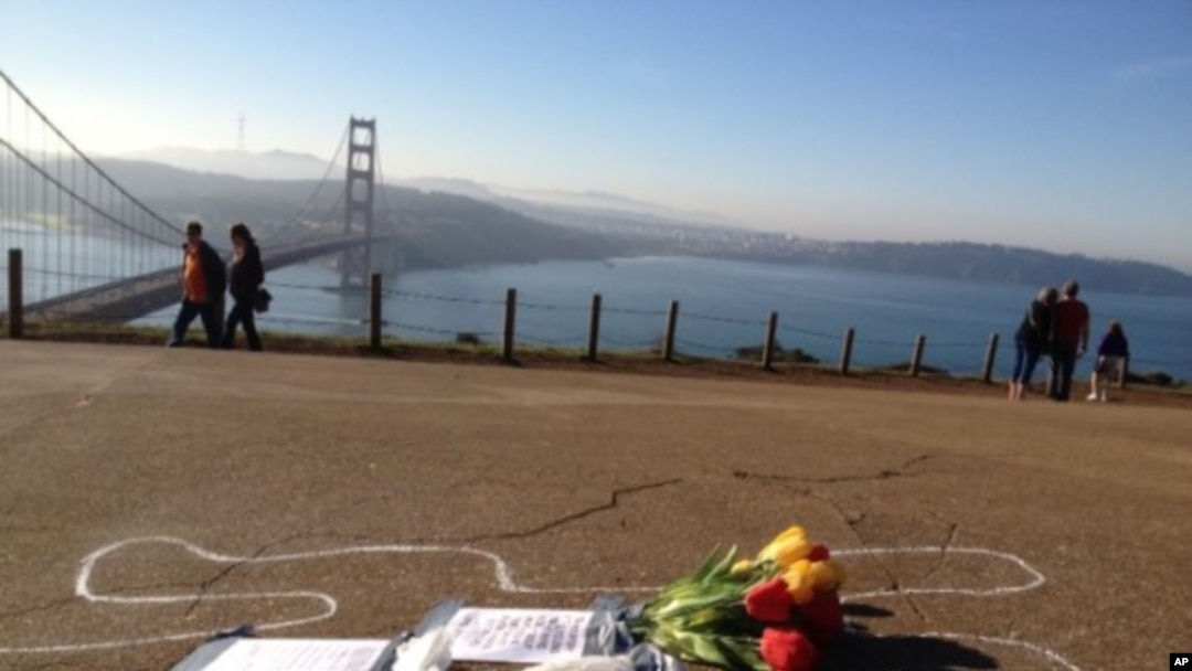 A chalk outline of a body is seen near the Golden Gate bridge in San Francisco.