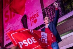 Spain's Prime Minister and Socialist Party leader Pedro Sanchez gestures to supporters outside the party headquarters following the general election in Madrid, Nov.10, 2019.
