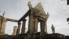 FILE - A Cambodian temple security guard stands at Preah Vihear temple, Cambodia, July 18, 2012.