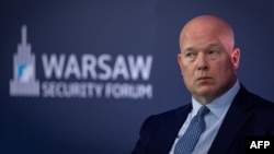 Посол США при НАТО Метью Вітакер під час Варшавського безпекового форуму у Польщі 12 жовтня 2026 року. Фото: Wojtek RADWANSKI/ AFP