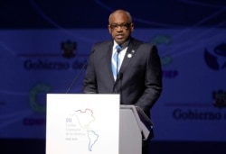 Bahamas's Prime Minister Hubert Minnis gives a speech during Americas Economics Summit in Lima, Peru, Apr. 13, 2018.