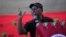 FILE - Economic Freedom Fighters opposition party leader Julius Malema addresses supporters and volunteers near Durban, South Africa, on Feb. 8. 2024. The fiery populist politician has been charged with hate speech and for firing a gun at a public rally.