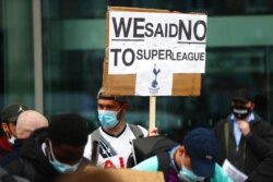 Tottenham fans protest the planned creation of a European Super League, outside the Tottenham Hotspur Stadium ahead of the English Premier League football match between Tottenham Hotspur and Southampton in London, April 21, 2021.