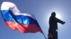 Celebrations continued in Simferopol's Lenin Square after Crimeans approved joining Russia, March 17, 2014. (Elizabeth Arrott/VOA)