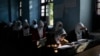 FILE - Afghan girls participate a lesson at Tajrobawai Girls High School, in Herat, Afghanistan, Nov. 25, 2021.