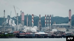 ILUSTRASI - Kilang minyak di Balikpapan, Provinsi Kalimantan Timur, 9 Juli 2024. (Yasuyoshi CHIBA / AFP)