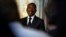 FILE - Benin President Patrice Talon holds a press conference in Paris, March 5, 2018. A radio station belonging to one of Talon's opponents has fired its staff after Benin's communication watchdog pulled its license.