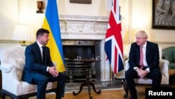 Britain's Prime Minister Boris Johnson meets Ukraine's President Volodymyr Zelenskiy in Downing Street in London, Britain, Oct. 8, 2020. 