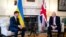 Britain's Prime Minister Boris Johnson meets Ukraine's President Volodymyr Zelenskiy in Downing Street in London, Britain, Oct. 8, 2020. 