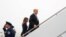 FILE - U.S. President Donald Trump and first lady Melania Trump board Air Force One as they depart Washington en route to Pennsylvania from Joint Base Andrews in Maryland, Sept. 11, 2018.