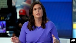 FILE - Fox News contributor and former White House spokesperson Sarah Sanders makes her first appearance on the "Fox & Friends" television program in New York, Sept. 6, 2019.