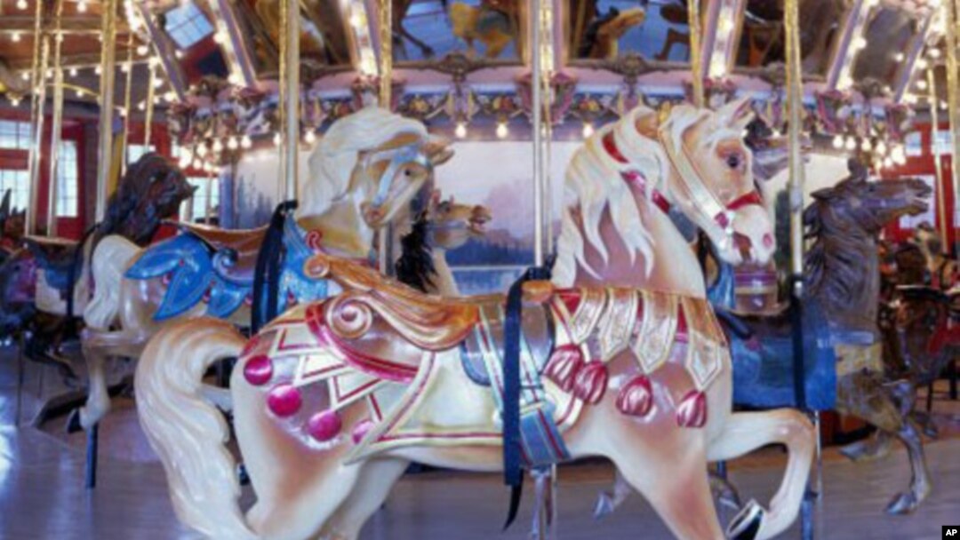 Wooden horses this genuine Hershell carousel are lovingly maintained. One such merry-go-round was found, abandoned and choked with weeds in a Colorado field, and beautifully restored.
