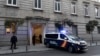 FILE - A Spanish National Police van is shown at the Spanish Supreme Court in Madrid, Feb. 14, 2019. Spain's National Police said they have ended a human trafficking ring that lured more than 1,000 women to the country over the past year.