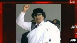 Ảnh chụp từ đài truyền hình Arrai Syria-cho thấy ông Gadhafi trong thông điệp phát đi từ một địa điểm không được tiết lộ, ngày 8/9/2011