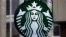 FILE - The Starbucks logo is seen at a shop in downtown Pittsburgh, Pennsylvania, March 14, 2017.