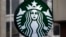 FILE - The Starbucks logo is seen at a shop in downtown Pittsburgh, Pennsylvania, March 14, 2017.
