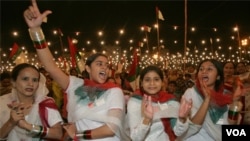 Para peserta rally mengkampanyekan persamaan hak perempuan di Karachi, Pakistan selatan (19/2).