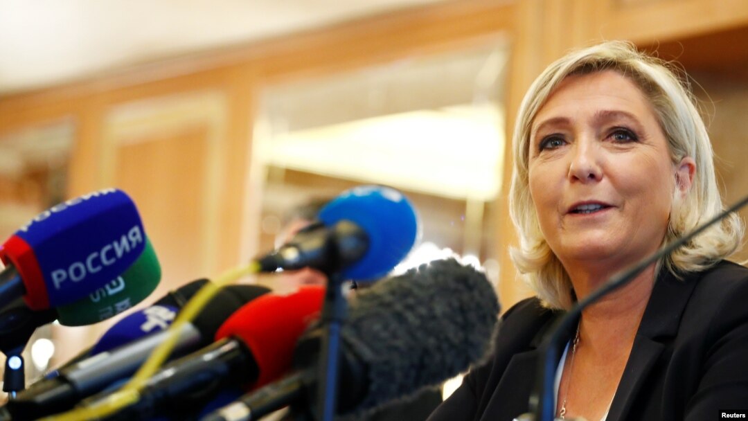 Leader of France's National Rally Party Marine Le Pen speaks during a news conference in Milan, Italy, May 18, 2019. 