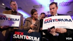 Los partidarios del ex senador por Pennsylvania, Rick Santorum, siguieron con mucha atención el conteo de la votación en Iowa.