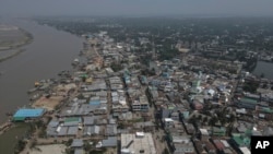 An aerial view shows Mongla town in Bangladesh, March 3, 2022. (AP Photo/Mahmud Hossain Opu)