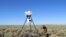 This is one of six solar-powered loudspeakers mimicking natural gas well field compressor noise at study sites on Idaho's Snake River Plain (VOA/T. Banse)