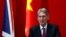 FILE - British Foreign Secretary Philip Hammond delivers his speech at Peking University in Beijing, Aug. 12, 2015. 