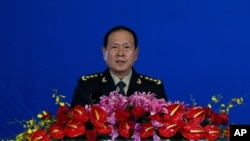 Chinese Defense Minister Wei Fenghe delivers his opening speech for the Xiangshan Forum, a gathering of the region's security officials, in Beijing, Oct. 21, 2019.