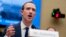 FILE - Facebook CEO Mark Zuckerberg testifies before a House Energy and Commerce hearing on Capitol Hill in Washington about the use of Facebook data to target American voters in the 2016 election and data privacy, April 11, 2018.