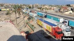 کامیون‌های حامل کمک‌های بشردوستانه در مرز غزه و مصر