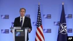 U.S. Secretary of State Antony Blinken delivers remarks with NATO Secretary General Jens Stoltenberg prior to a NATO foreign ministers meeting at NATO headquarters in Brussels, March 23, 2021.