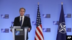 U.S. Secretary of State Antony Blinken delivers remarks with NATO Secretary General Jens Stoltenberg prior to a NATO foreign ministers meeting at NATO headquarters in Brussels, March 23, 2021.