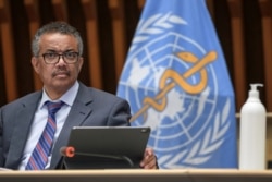 FILE - World Health Organization (WHO) Director-General Tedros Adhanom Ghebreyesus attends a news conference organized by Geneva Association of United Nations Correspondents (ACANU) amid the COVID-19 outbreak, caused by the novel coronavirus.
