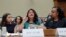 FILE -Congresswoman Rashida Tlaib, D-Mich., center, testifies before the House Oversight Committee hearing on family separation and detention centers, July 12, 2019, on Capitol Hill in Washington. 