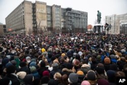 People gather in Pushkin Square during a protest against the jailing of opposition leader Alexei Navalny in Moscow, Jan. 23, 2021. Russian police arrested hundreds of protesters.