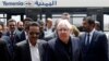 FILE - U.N. envoy to Yemen Martin Griffiths, center, arrives at Sanaa, Yemen, July 2, 2018.