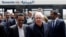 FILE - U.N. envoy to Yemen Martin Griffiths, center, arrives at Sanaa, Yemen, July 2, 2018.