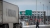 A truck drives on its way to enter the United States at a border crossing at the Canada-US border in Blackpool, Quebec, Canada, on Feb. 2, 2025.