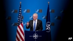 U.S. Defernse Secretary Jim Mattis talks to journalists during a news conference at the end of the second day of a meeting of the North Atlantic Council at a gathering of NATO defense ministers at NATO headquarters in Brussels, Belgium, Oct. 4, 2018. 