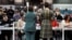 Ballots are tallied at a counting center for Britain's general election in Glasgow, Britain, Dec. 12, 2019. 