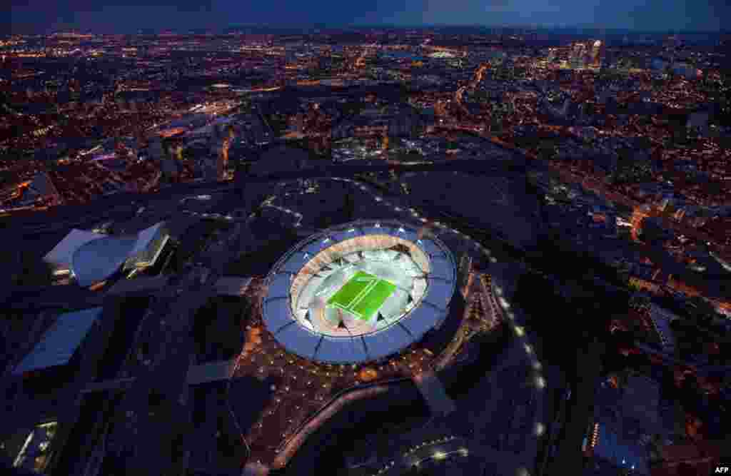 July 27: The Olympic Stadium in London is pictured, with the figure 1 mown into the grass to mark one year to go until the start of the London 2012 Olympic Games. REUTERS/Handout