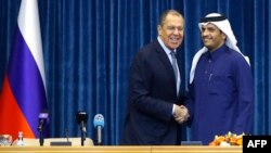 Qatari Foreign Minister Mohammed bin Abdulrahman al-Thani, right, attends a press conference with his Russian counterpart Sergey Lavrov at the Amiri Diwan Palace in the capital Doha, March 4, 2019. 