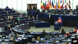 FILE - European Commission President Ursula von der Leyen delivers a State of the Union Address at the European Parliament in Strasbourg, France, Sept. 15, 2021.