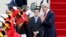 U.S. Secretary of State John Kerry, right, greets upon his arrival at Seoul military airport in Seongnam, South Korea, Apr. 12, 2013. 