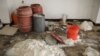 Chemicals used by Islamic State militants to produce bombs are seen inside a warehouse at a church in the town of Qaraqosh, south of Mosul, Iraq, April 12, 2017.