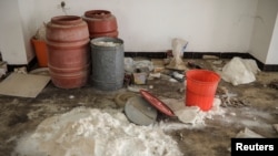 Chemicals used by Islamic State militants to produce bombs are seen inside a warehouse at a church in the town of Qaraqosh, south of Mosul, Iraq, April 12, 2017.