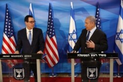 Israeli Prime Minister Benjamin Netanyahu and U.S. Treasury Secretary Steven Mnuchin deliver joint statements during their meeting in Jerusalem, Oct. 28, 2019.