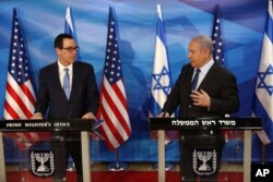 Israeli Prime Minister Benjamin Netanyahu and U.S. Treasury Secretary Steven Mnuchin deliver joint statements during their meeting in Jerusalem, Oct. 28, 2019.