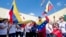 Dozens of demonstrators chant and wave Venezuelan flags in Doral, Florida, Feb. 18, 2014.